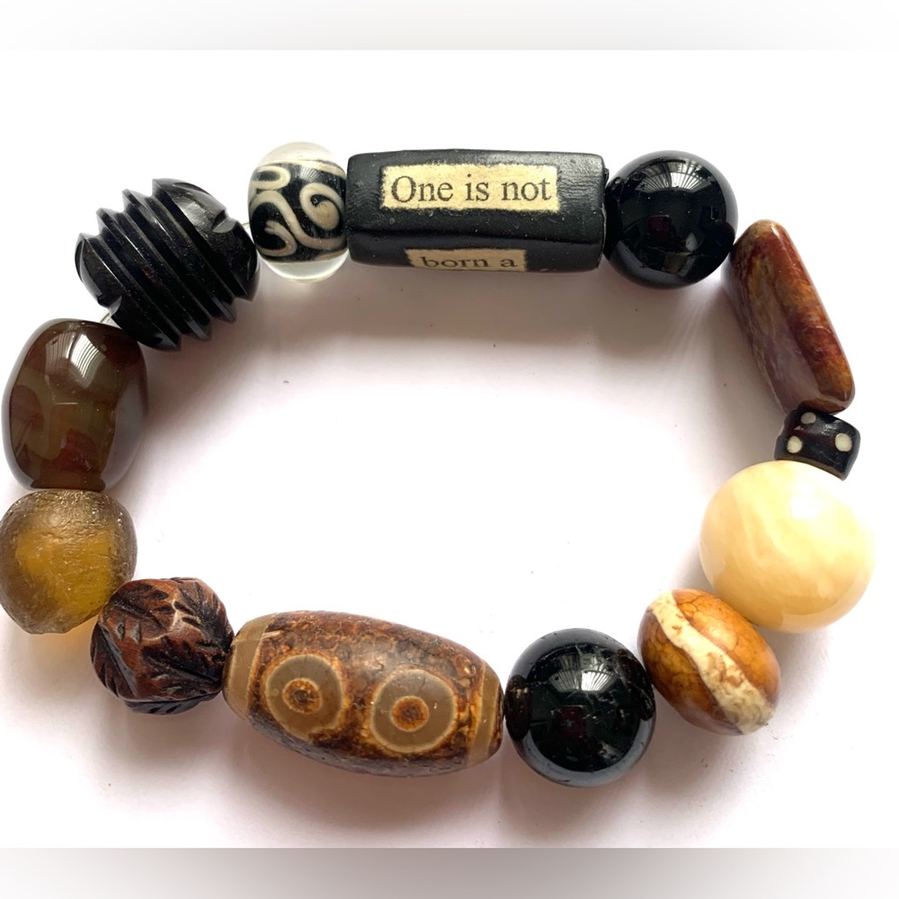 One is not born a woman, one becomes one stretch multi bead bracelet
